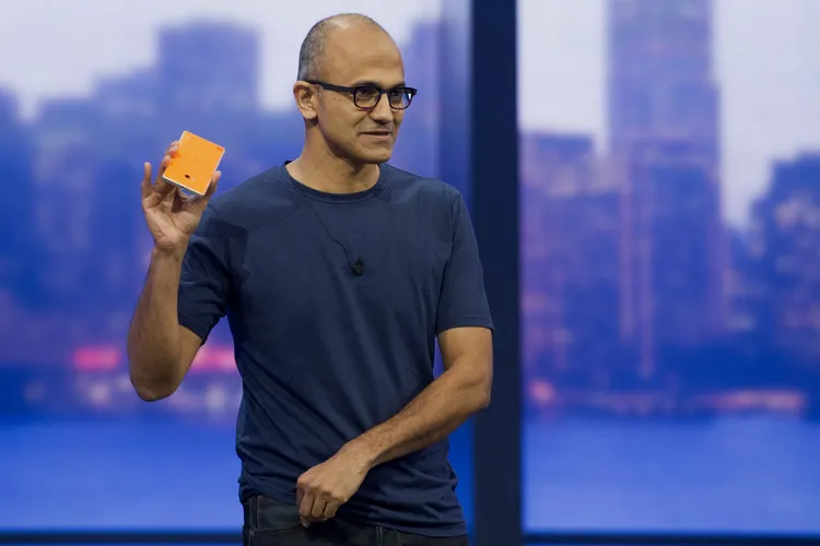 Microsoft CEO Satya Nadella with a Windows Phone
